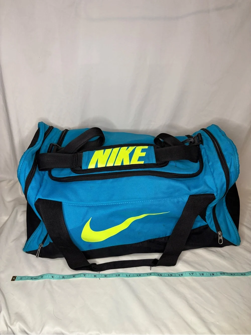 Nike Men’s Blue & Neon Yellow Duffel Bag With Side Pockets and Shoulder Strap